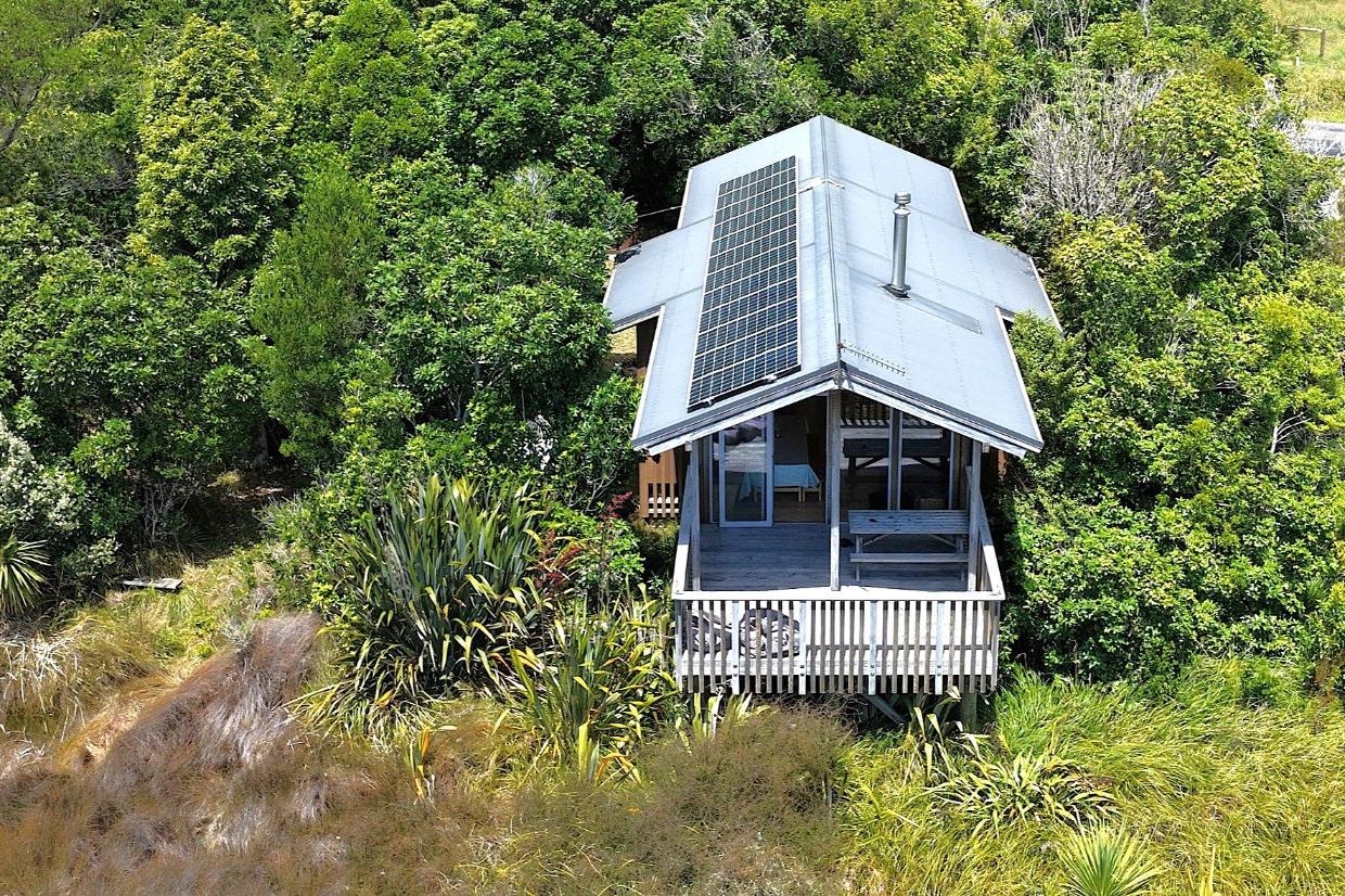 The eco cabin is completely off-grid, with the solar panels on the roof supplying all power requirements. There is gas hot water. 