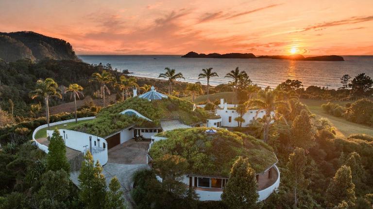 With its green roofs and unconventional design, this Ōpoutere property was designed to be the ultimate retreat. Photo: Bayleys