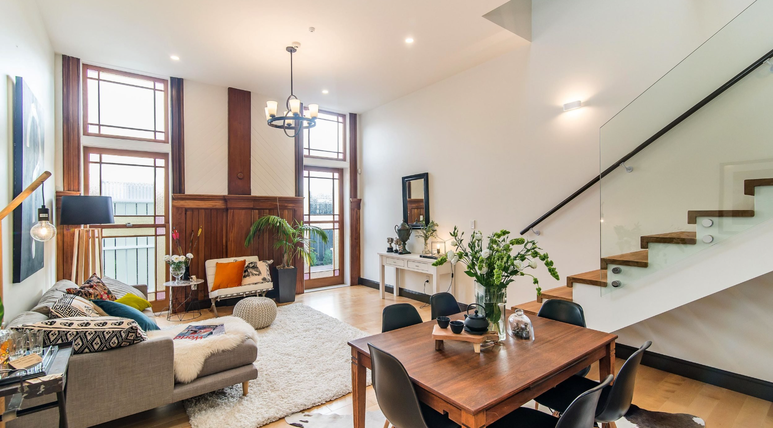 A glass balustrade makes this loft apartment floor plan feel spacious. Image: Paul McCredie