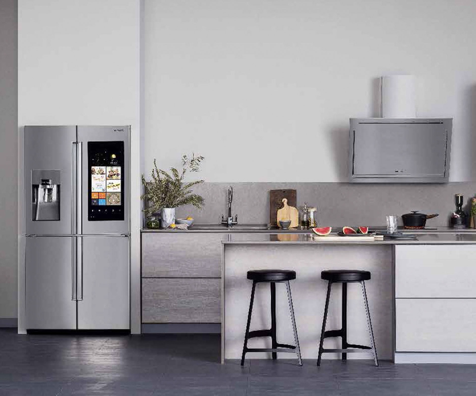 Picture of kitchen with Samsung family hub refrigerator. 