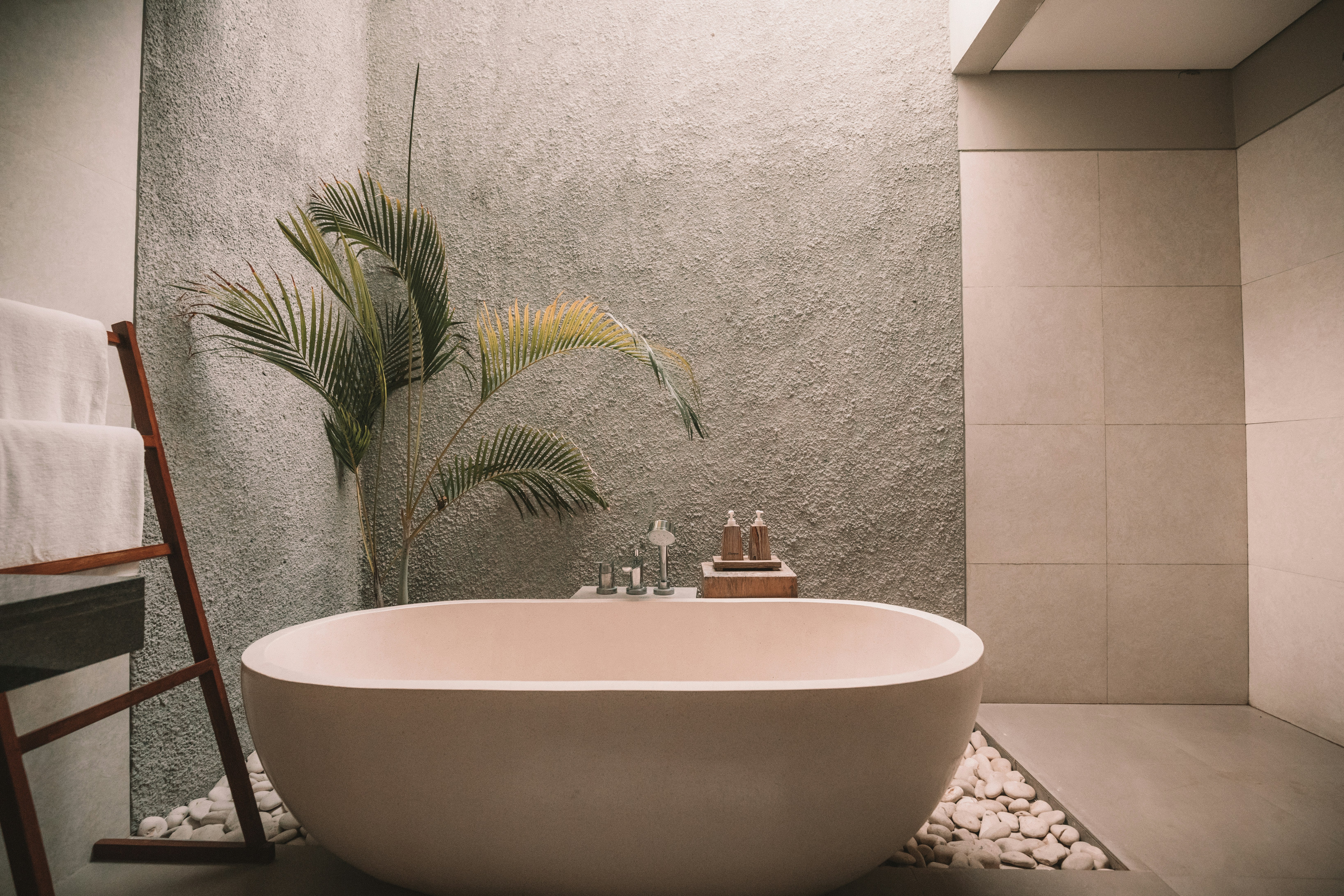 The options are endless when it comes to bathroom design, and there’s always room to get creative. This design concept imagines a relaxing, spa-like retreat using stones to surround a freestanding bath.