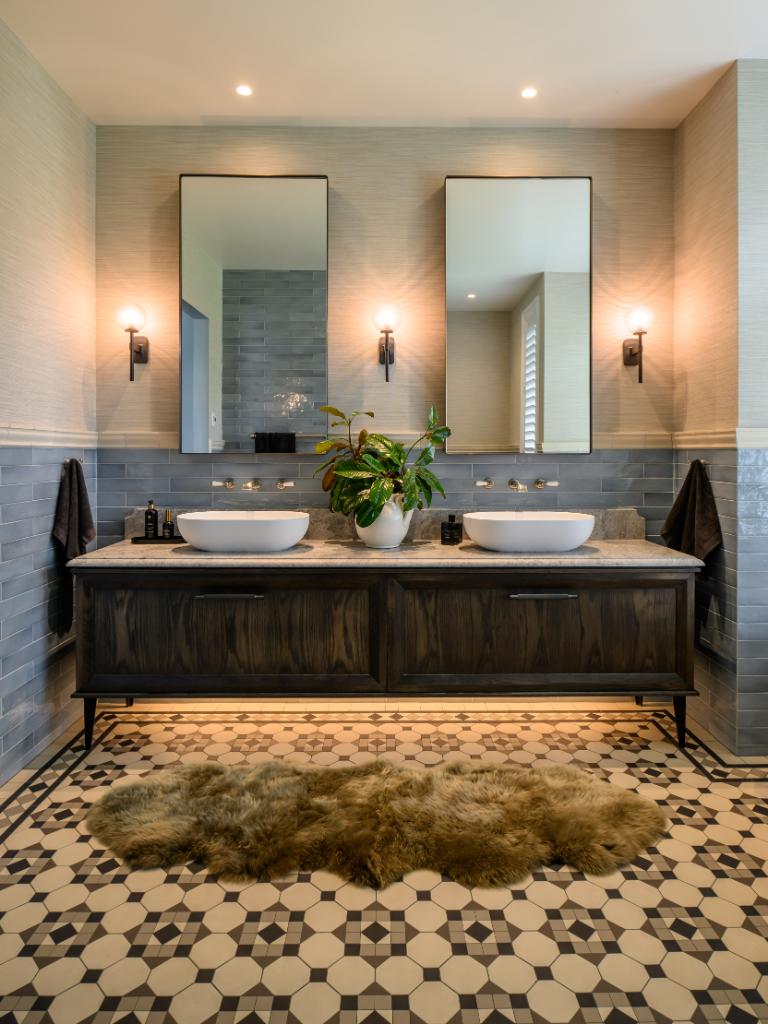 White vessel basins freshen the look. These are teamed with lever handle basin mixers. Photo: Stephen Goodenough