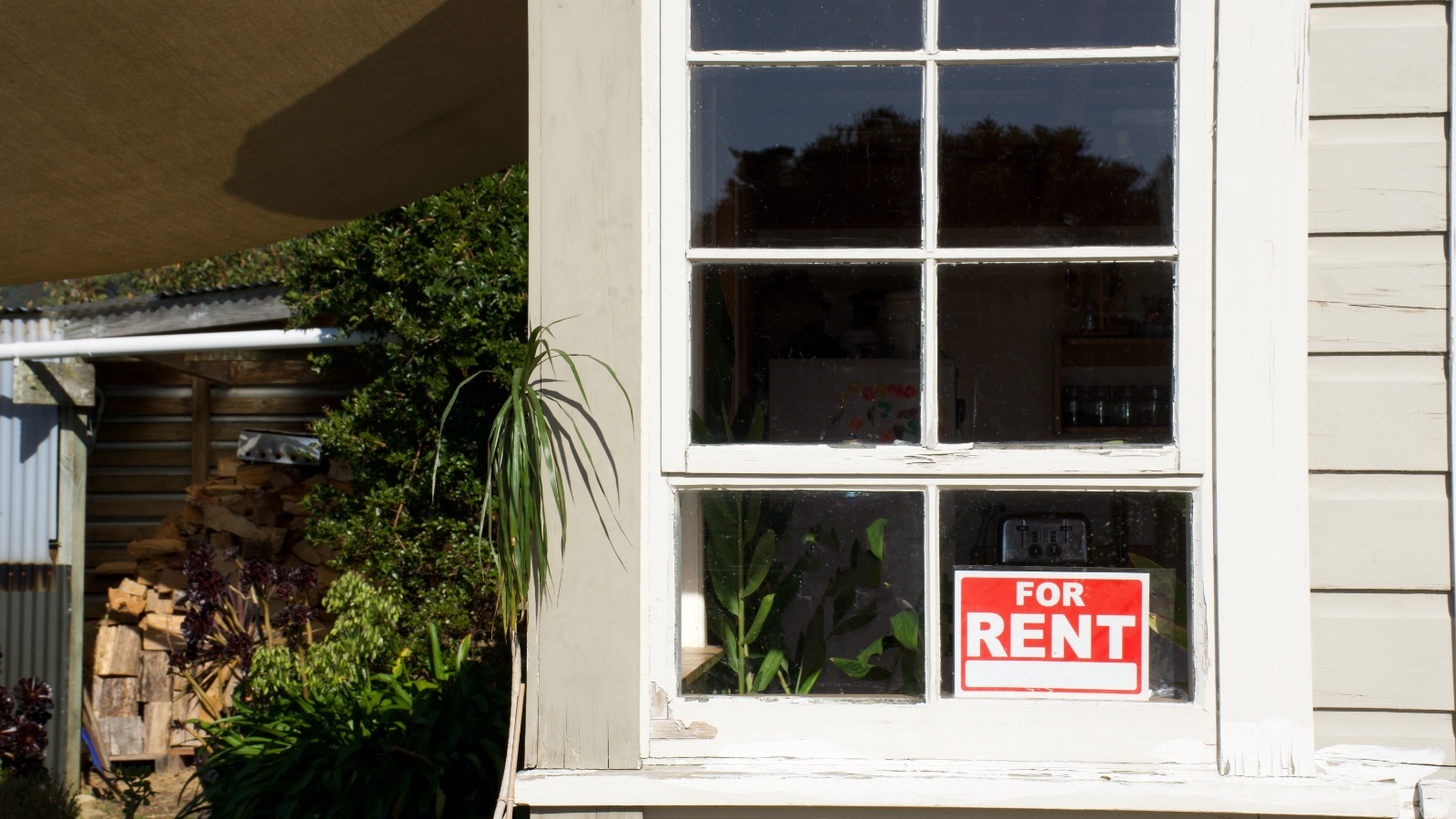 For rent sign in window. 