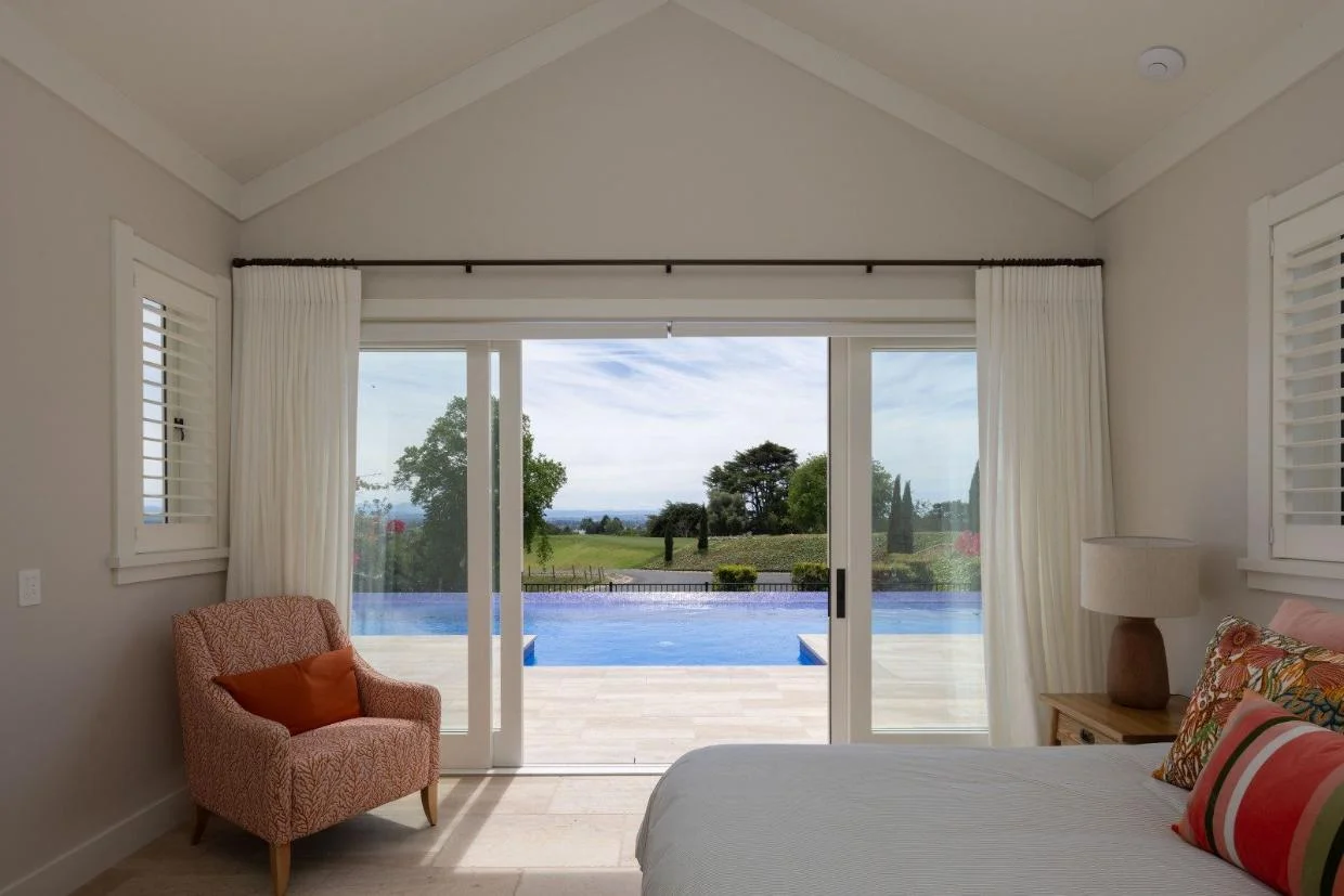 The ceiling in the pool pavilion follows the roofline. 