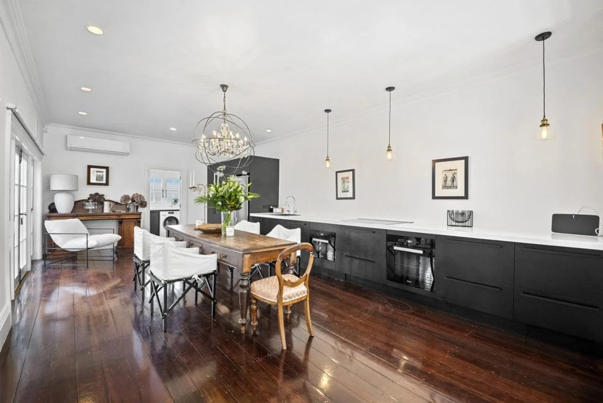 White blinds rather than traditional curtains keep the look sleek and uncluttered.