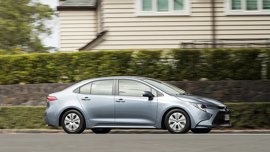 Toyota Corolla SX Hybrid sedan side action