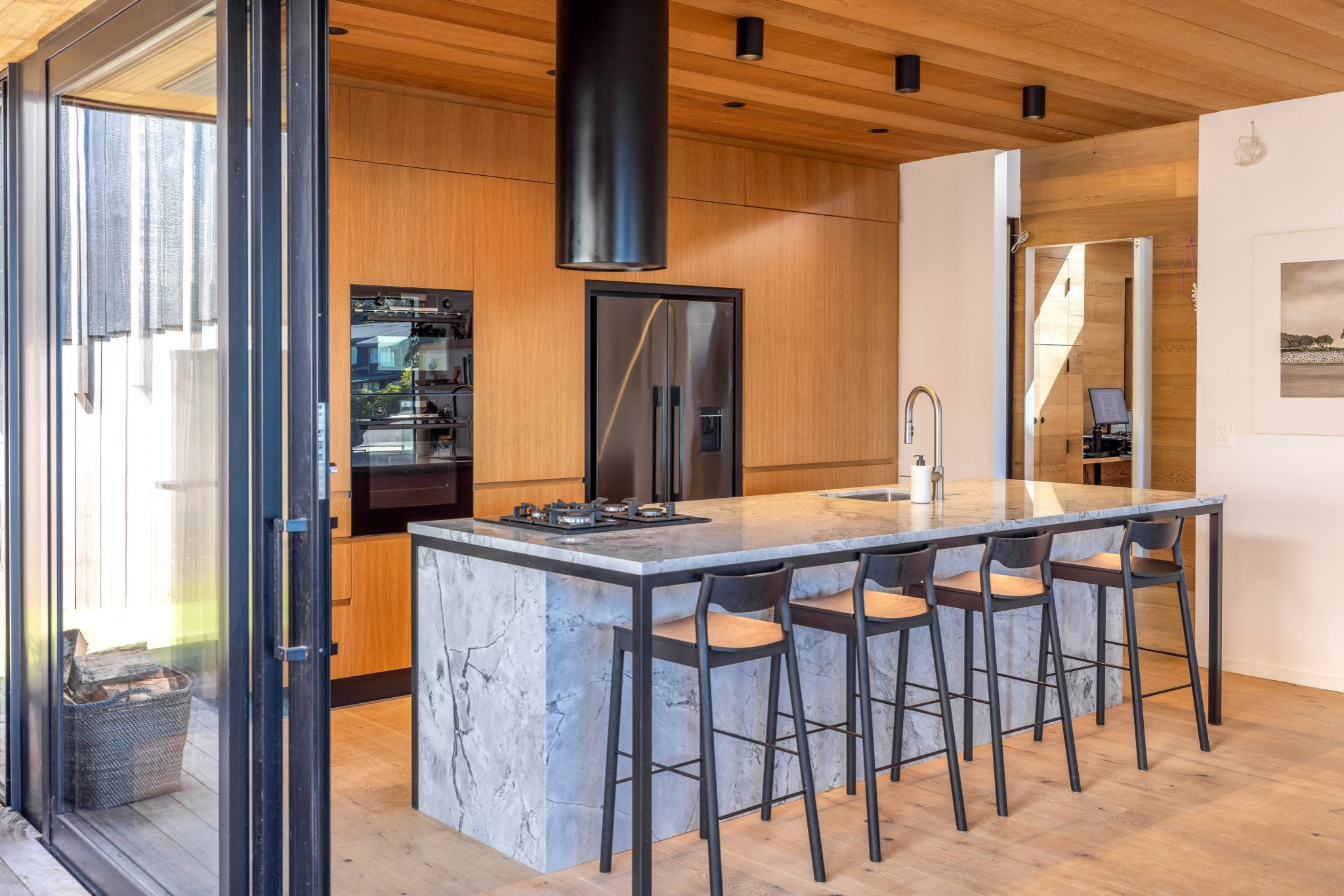 A stylish Shane George designed kitchen in the Palm Beach property