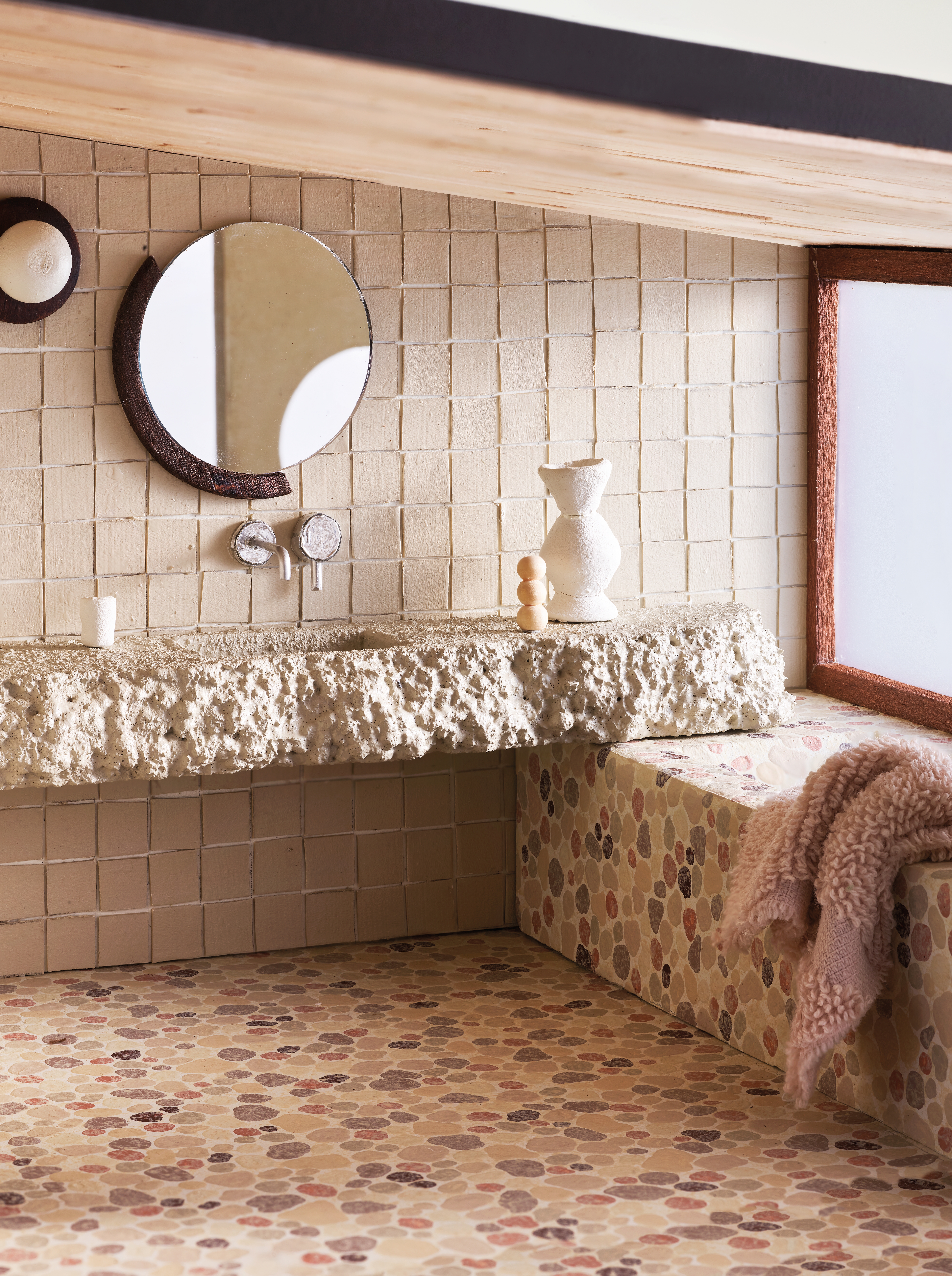 ABOVE: Light bulb and wall in Resene SpaceCote Low Sheen Kitchen & Bathroom in Resene Merino (the ‘grout’) and Resene SpaceCote Low Sheen Kitchen & Bathroom in Resene Tua Tua (the ‘tiles’); light and mirror surrounds in Resene Colorwood in Resene Deep Oak; vanity in Resene SpaceCote Low Sheen Kitchen & Bathroom in Resene Awaroa Bay; floor and bath see previous credit, resene.co.nz/colorshops. ABOVE: DECORATIVE ITEMS, FROM LEFT Towel made from a sample of a Cove bath towel, shopbaina.com. All other items see downloadable PDF guide.