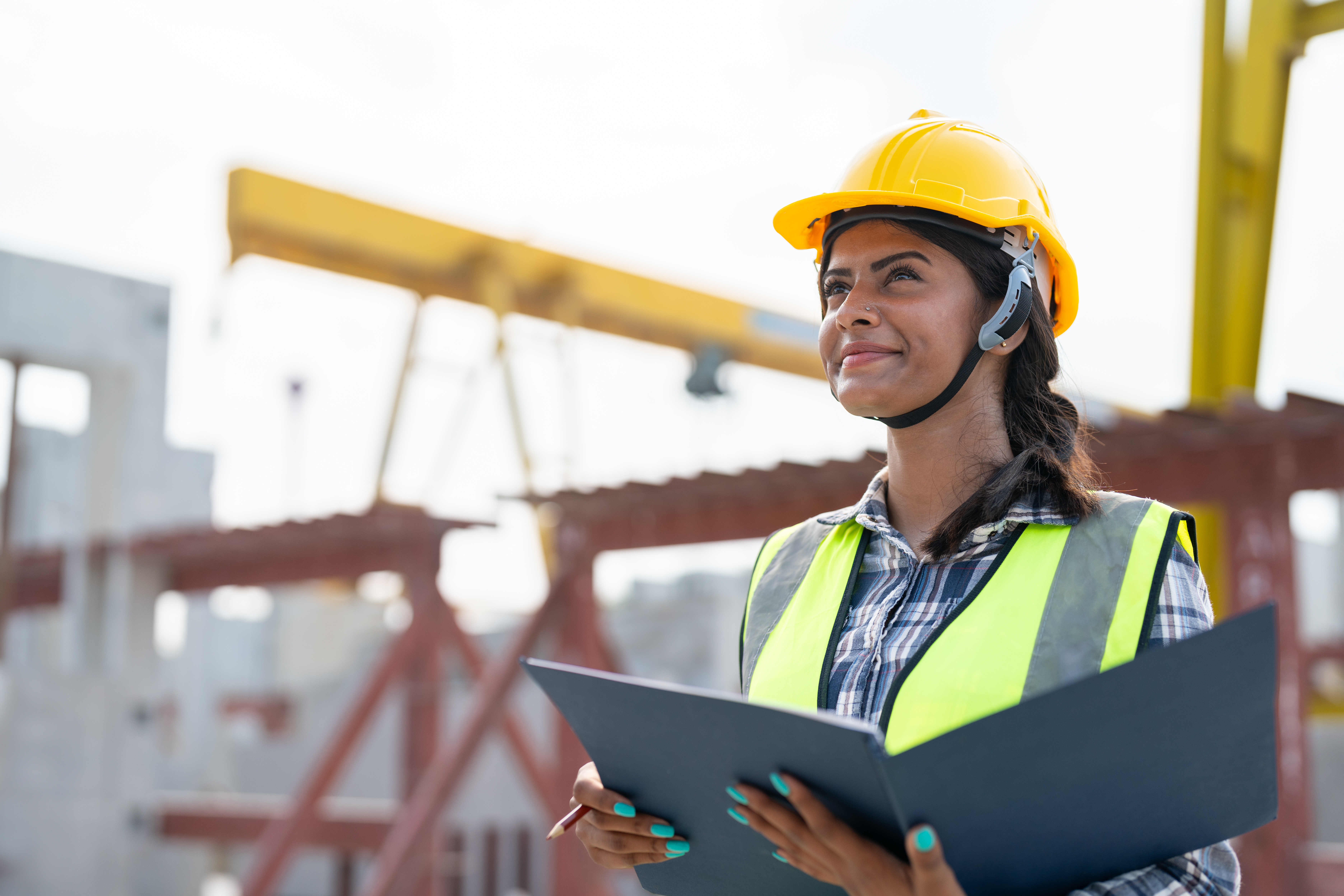 Female civil engineer working on-site.
