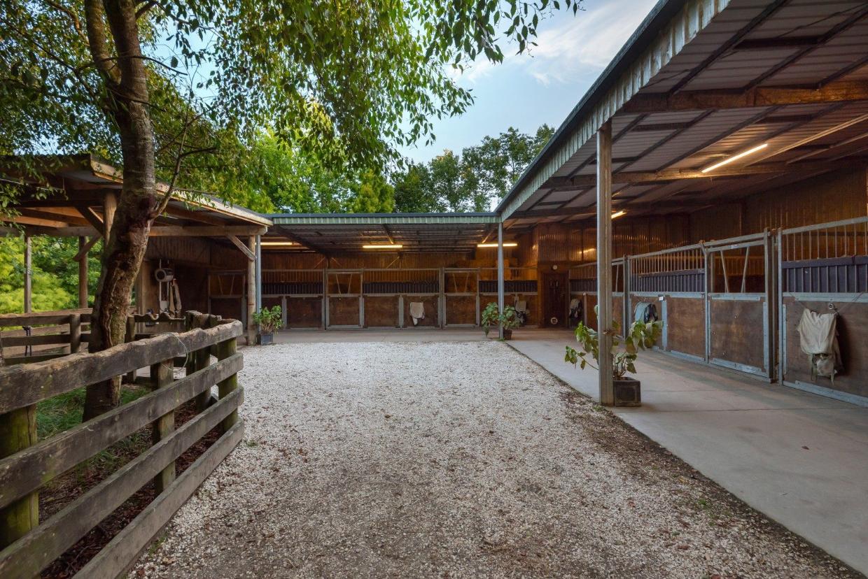 These are professional stables, with room for at least six horses. 