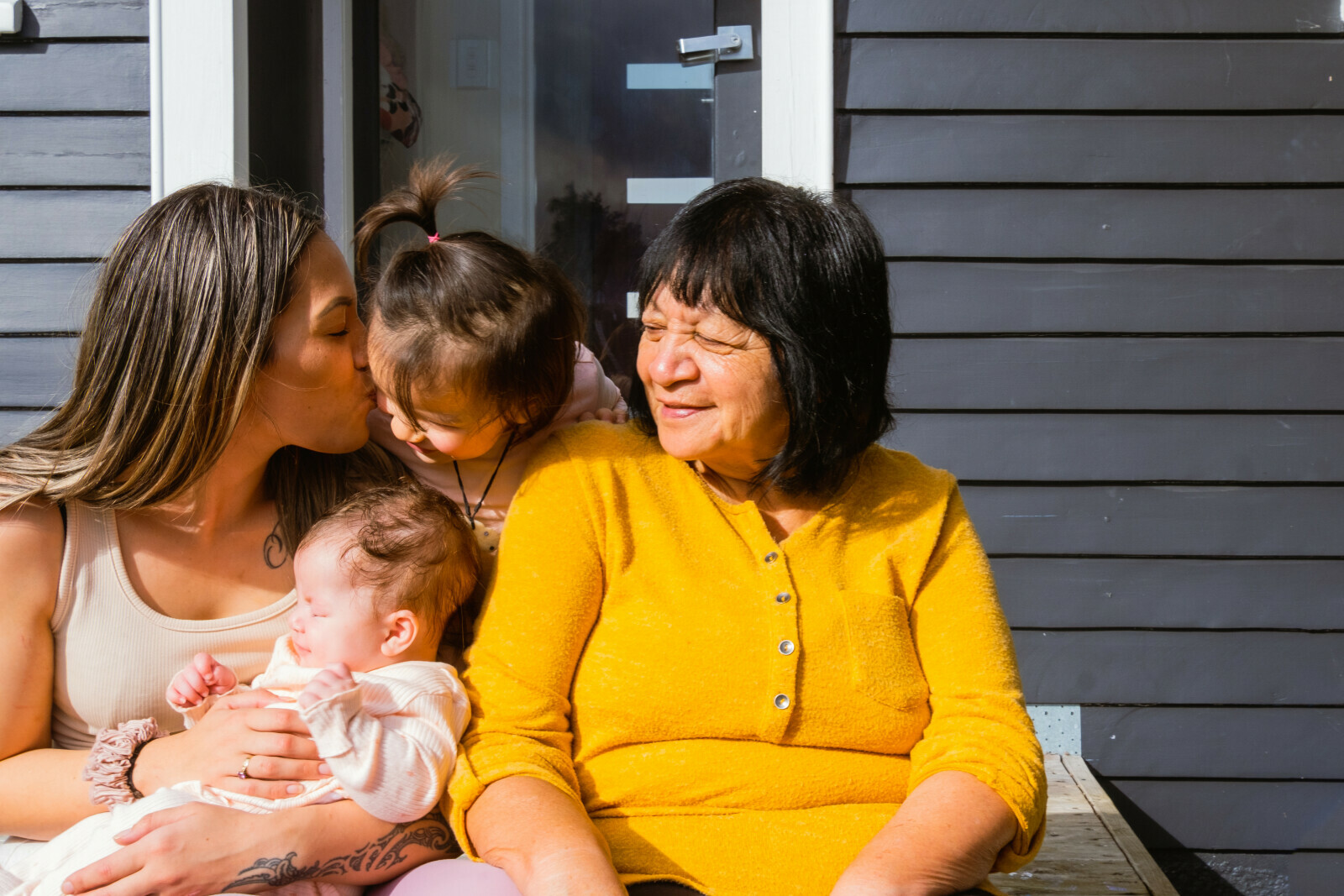 Mother and grandmother with two children