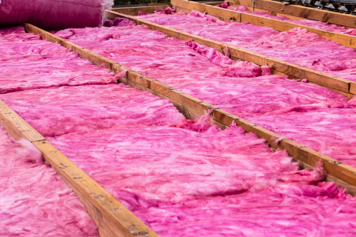 Pink insulation in floor of house. 