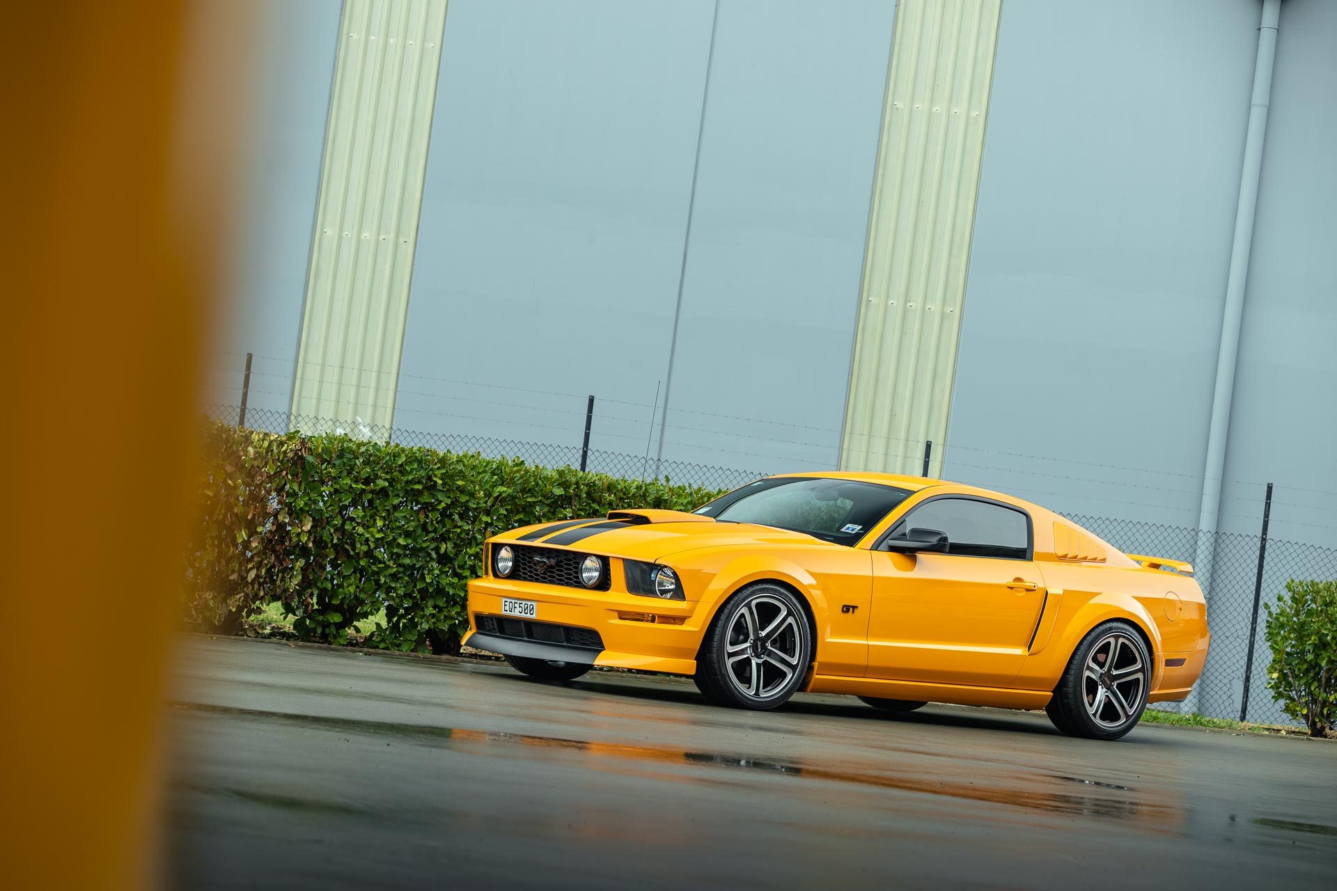 Yellow Ford MustangGT 2007 side view