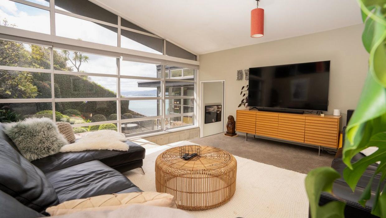 The second living area is a few steps up from the main floor. Photo: Lowe & Co