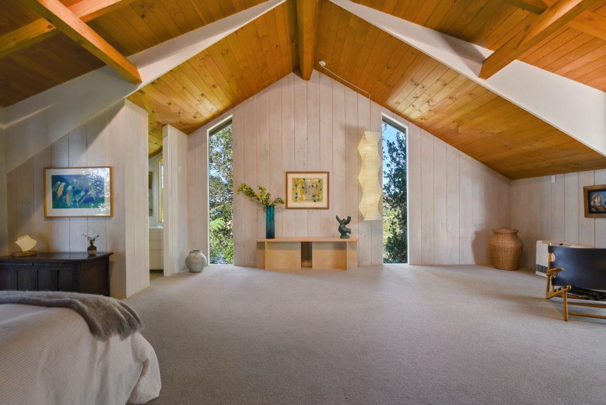 The primary bedroom has a private deck.