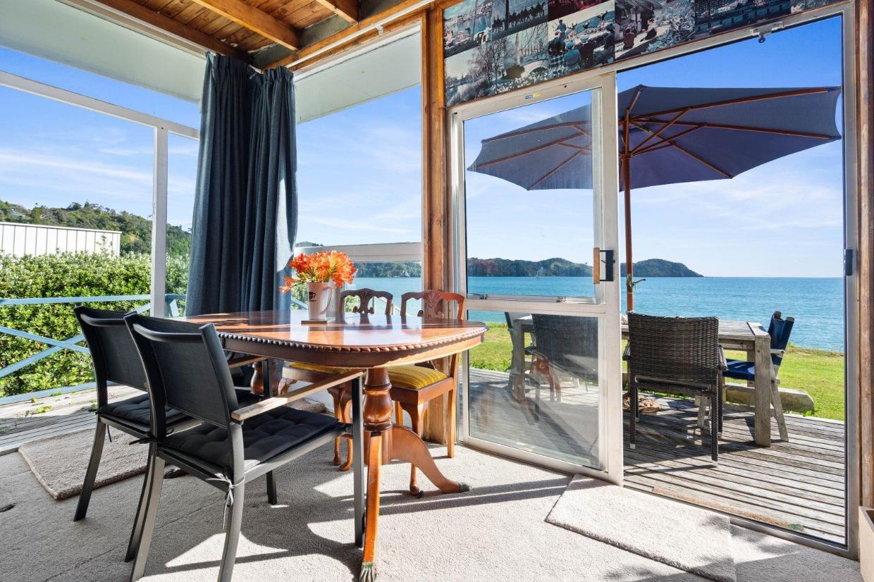 With a large slider, there’s an easy indoor-outdoor flow and great visibility. Photo: Bayleys