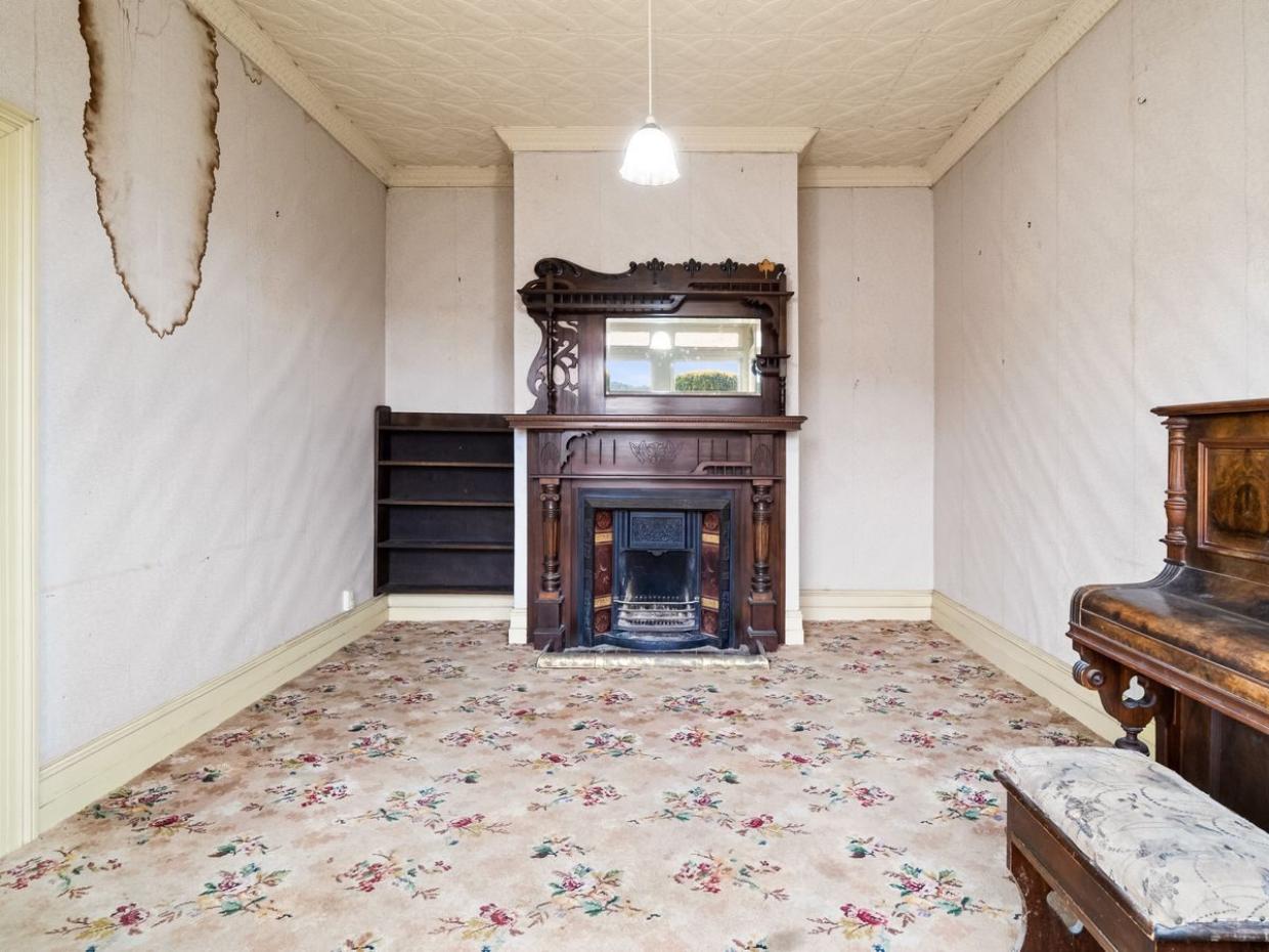 Inside, the house is a step back in time. Photo: BE Real Estate
