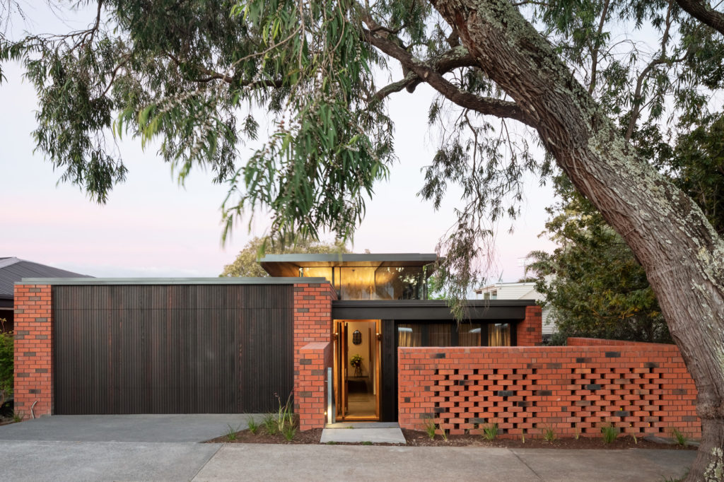Red brick and dark timber house 