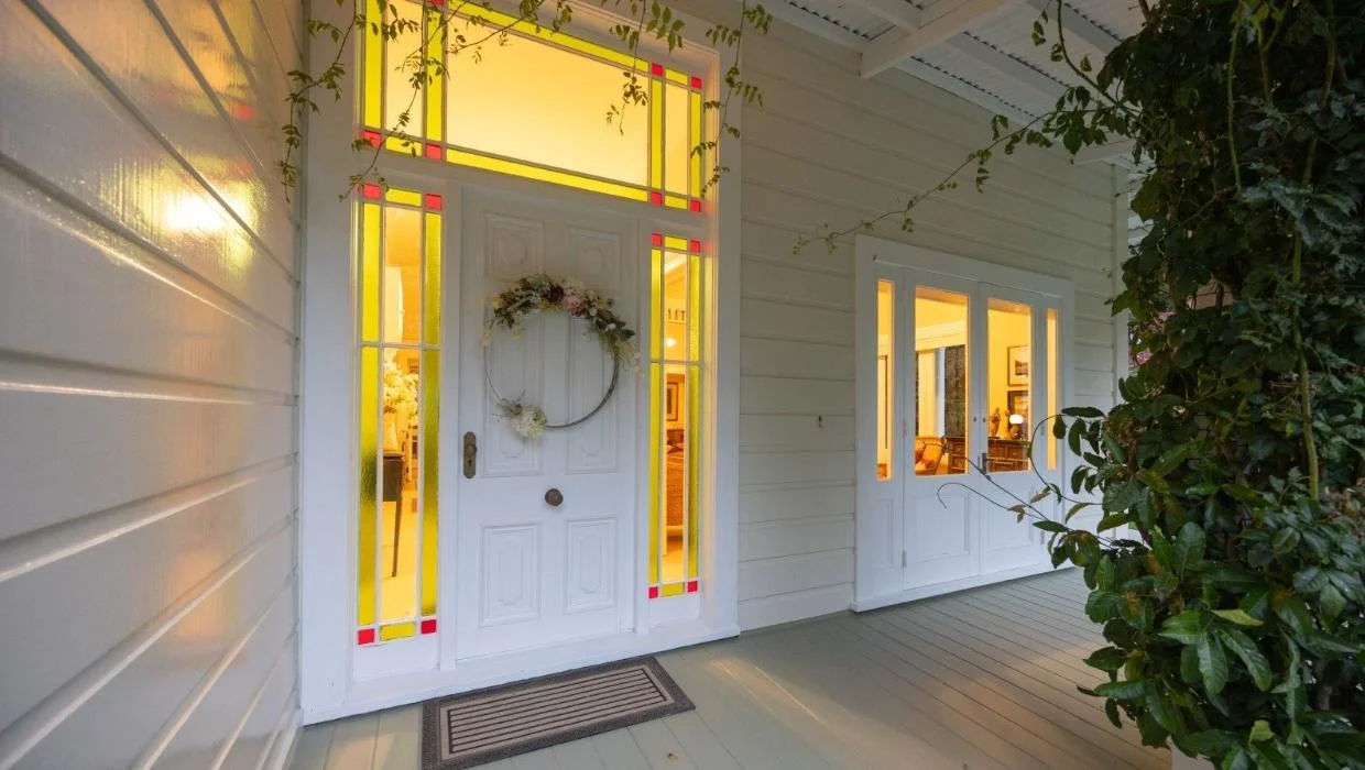 The home was built in 1874. The front door is pictured