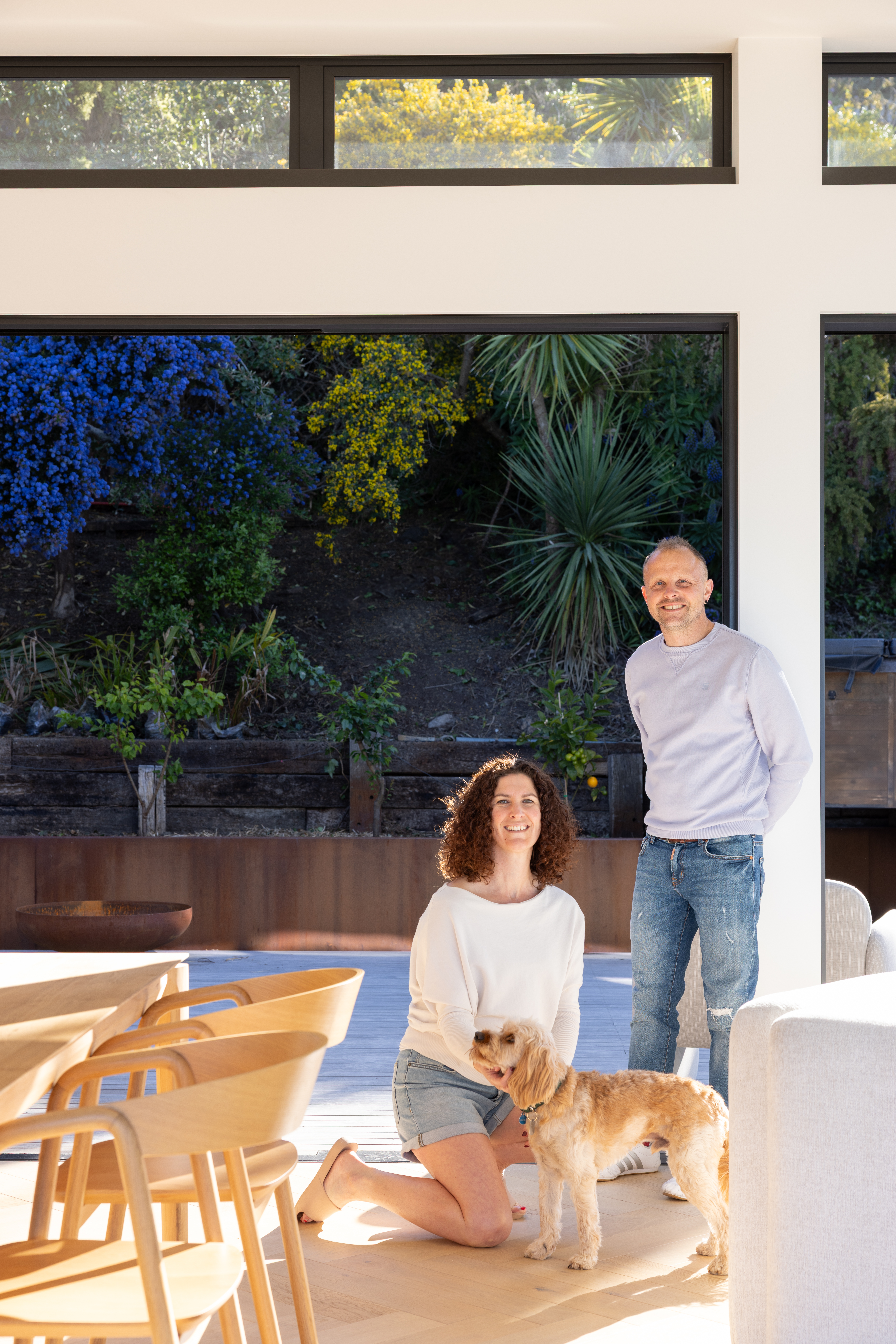 Owners and their dog at the home in Sumner. 