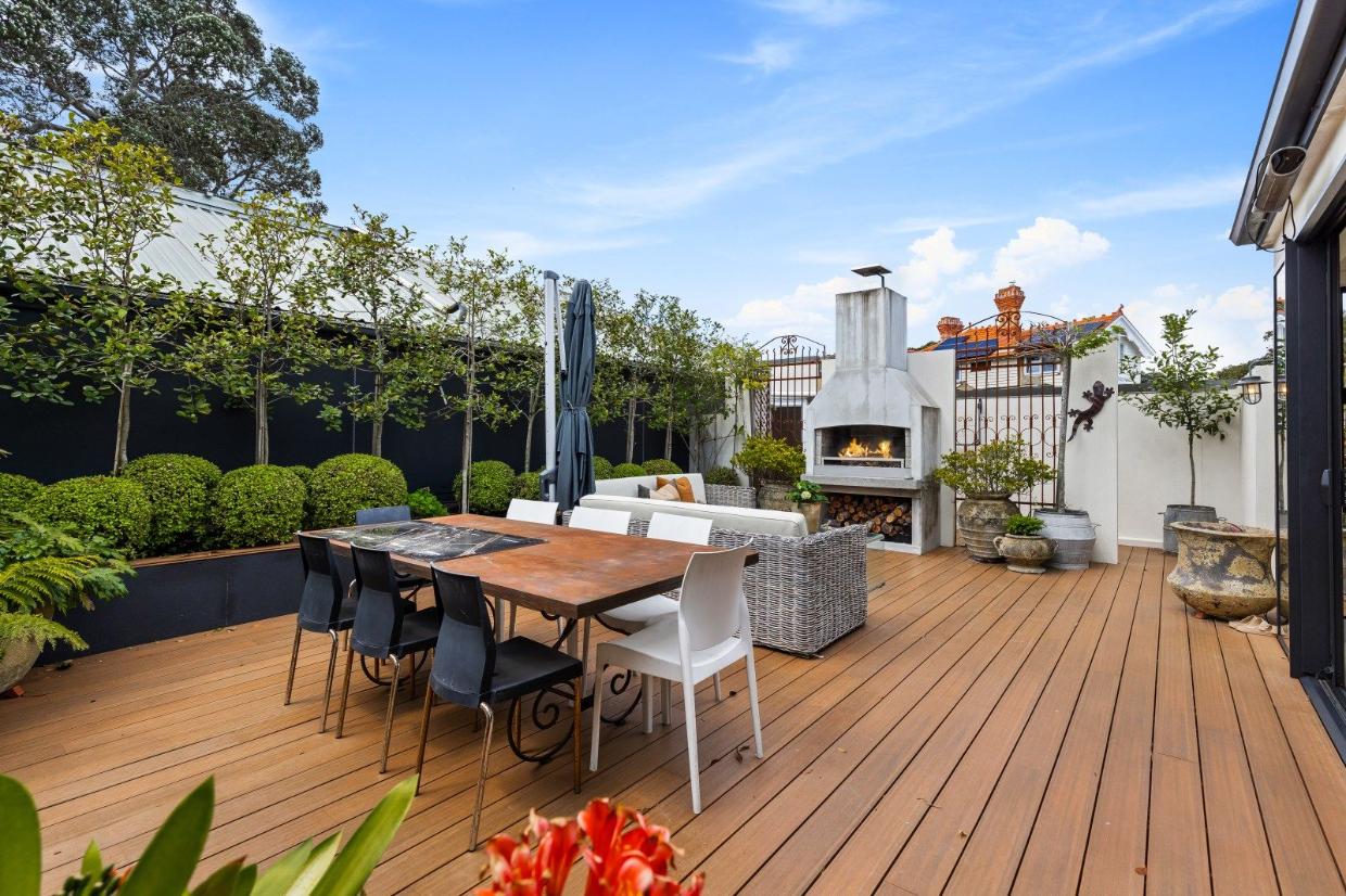 An alfresco entertaining area for all seasons - the fireplace comes into its own in the evening. 