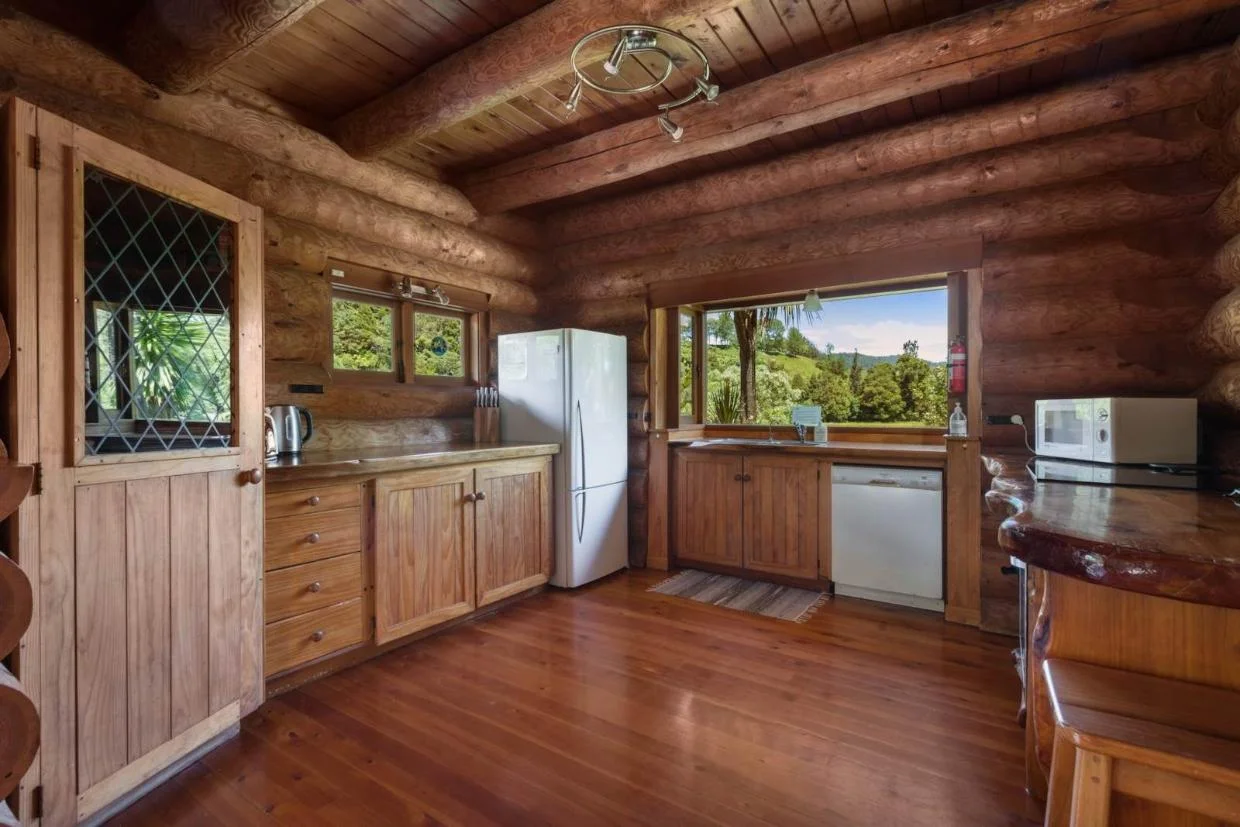 The kitchen looks out onto the fields.