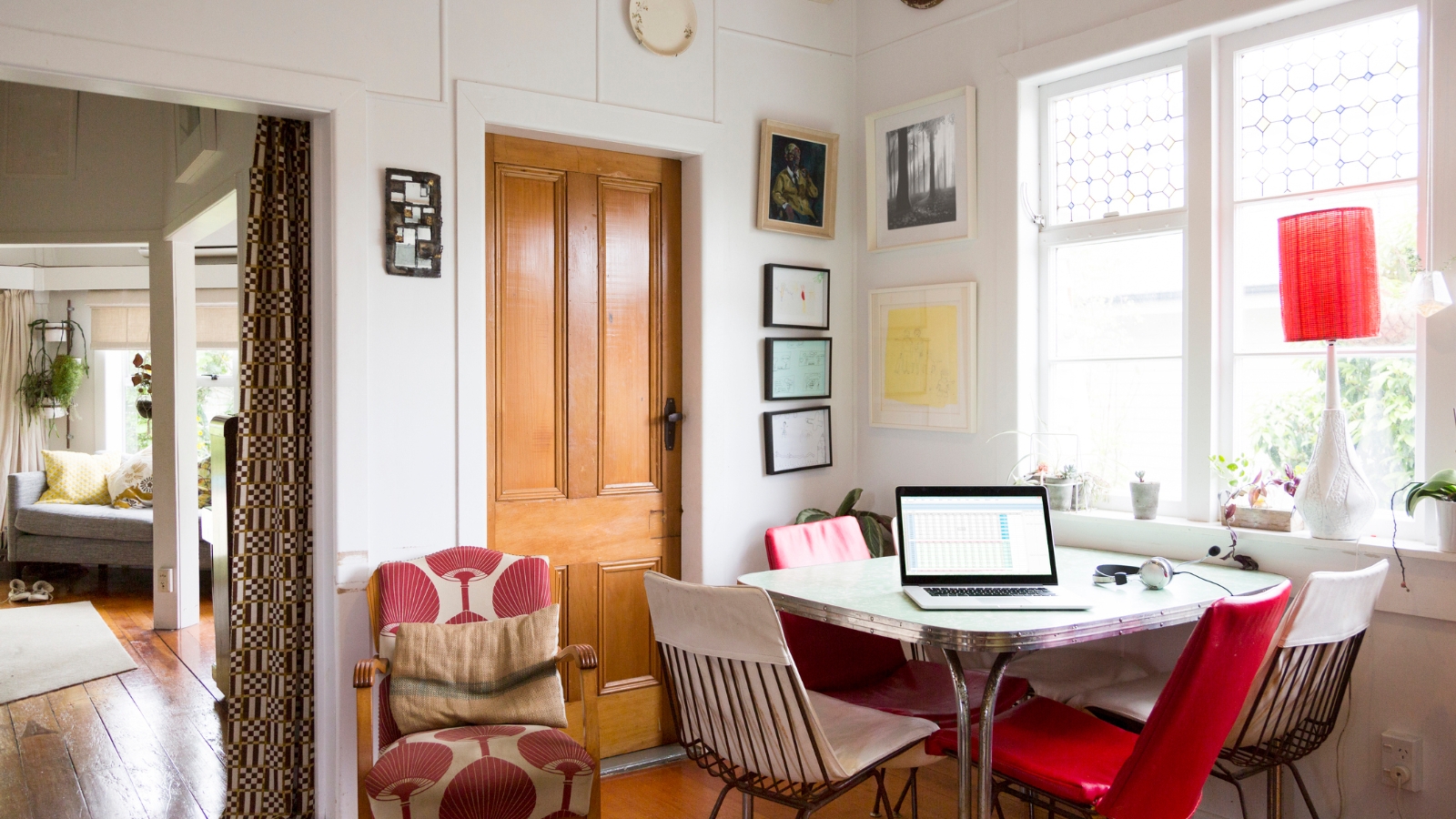 Image of home with laptop on table. 