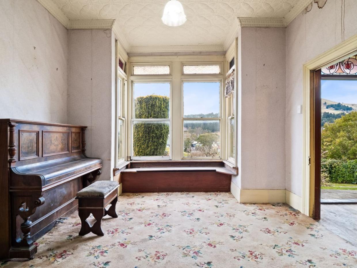 Inside, the house is a step back in time. Photo: BE Real Estate