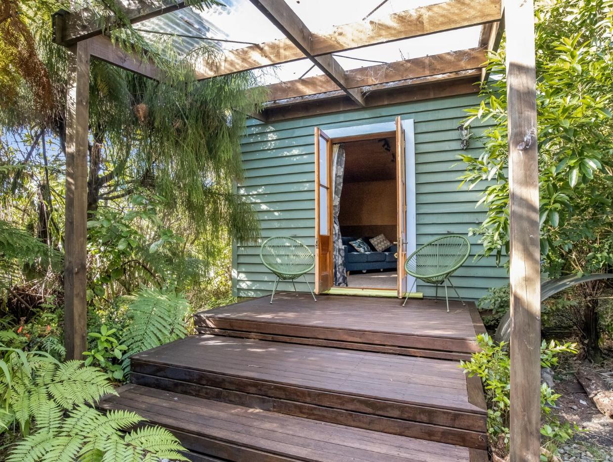 The sleep-out could be great for guests, an art studio, or a work from home office - or perhaps all three.