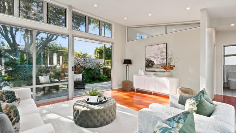 There are two reception rooms, including this large family room. Photo: TRADE ME/RAY WHITE