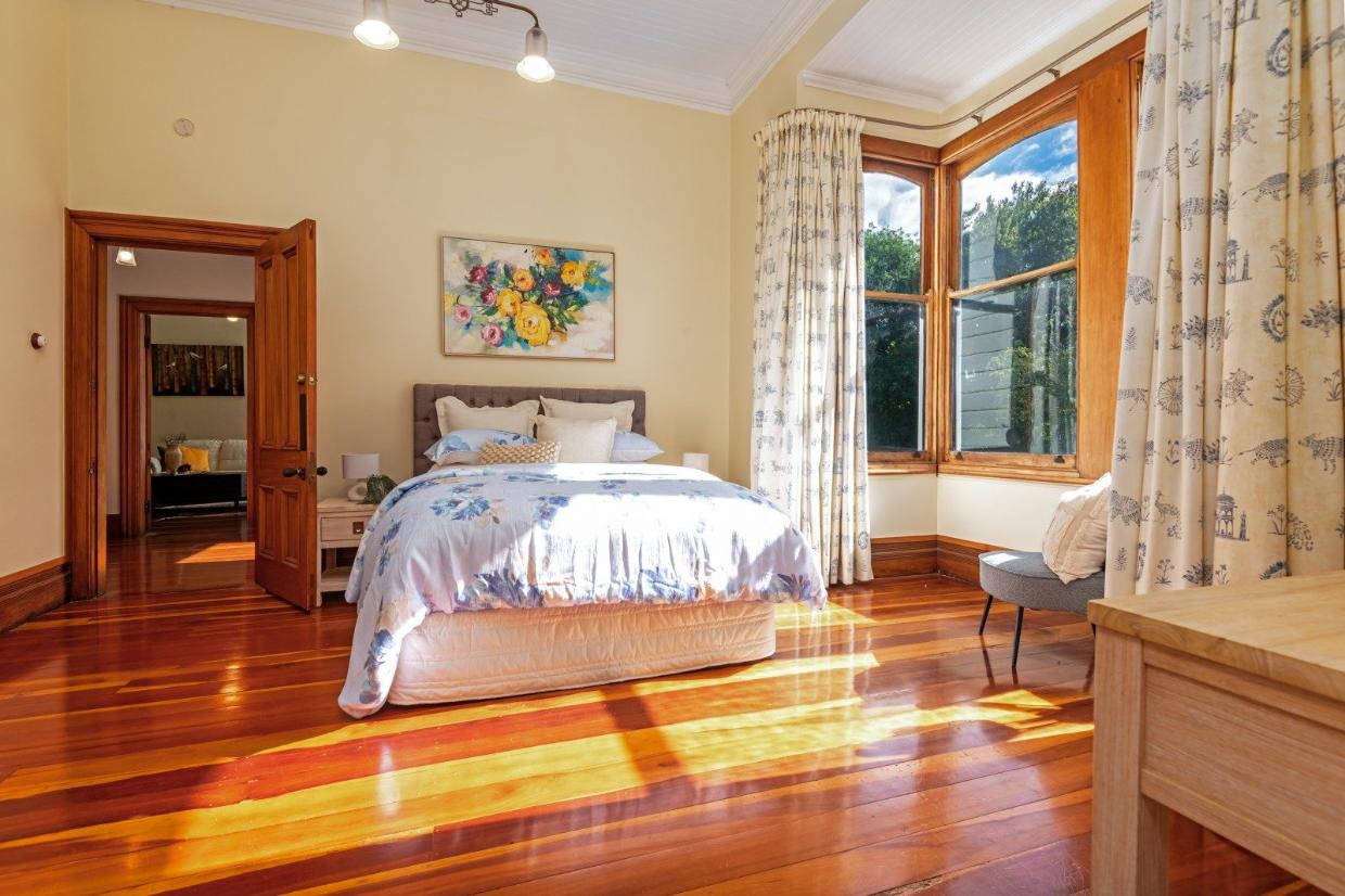Sunlight streams into this front bedroom in the afternoons.