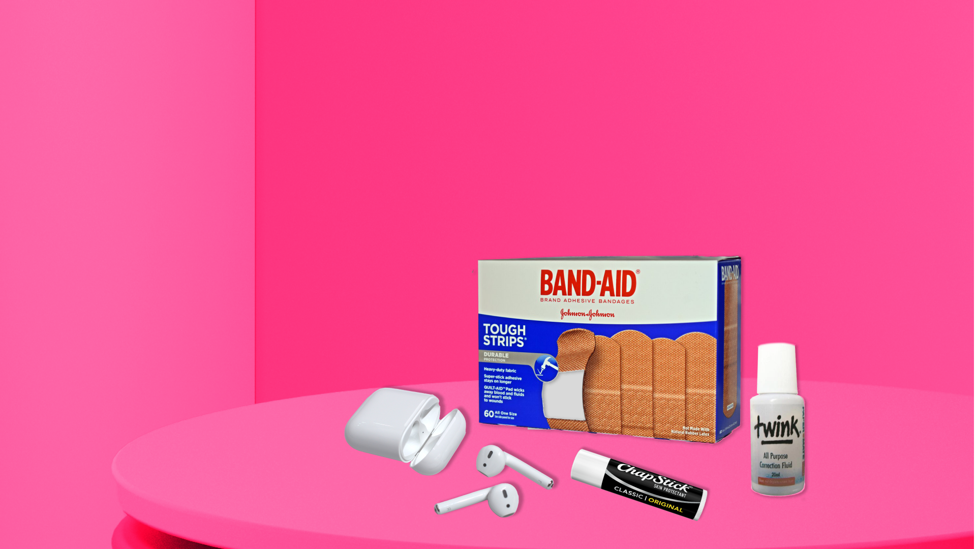 Left to right: Apple AirPods, a box of Band-Aids, Chapstick, Twink.