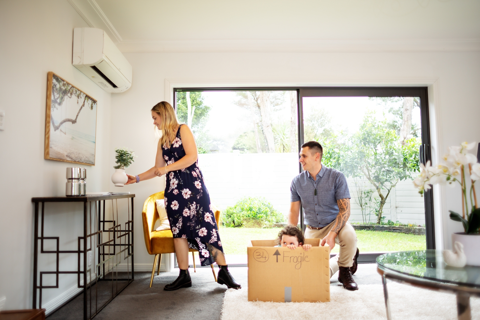 Couple decorating their living room