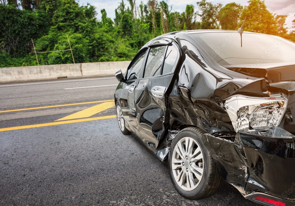 Black car that's crashed and needs car insurance.