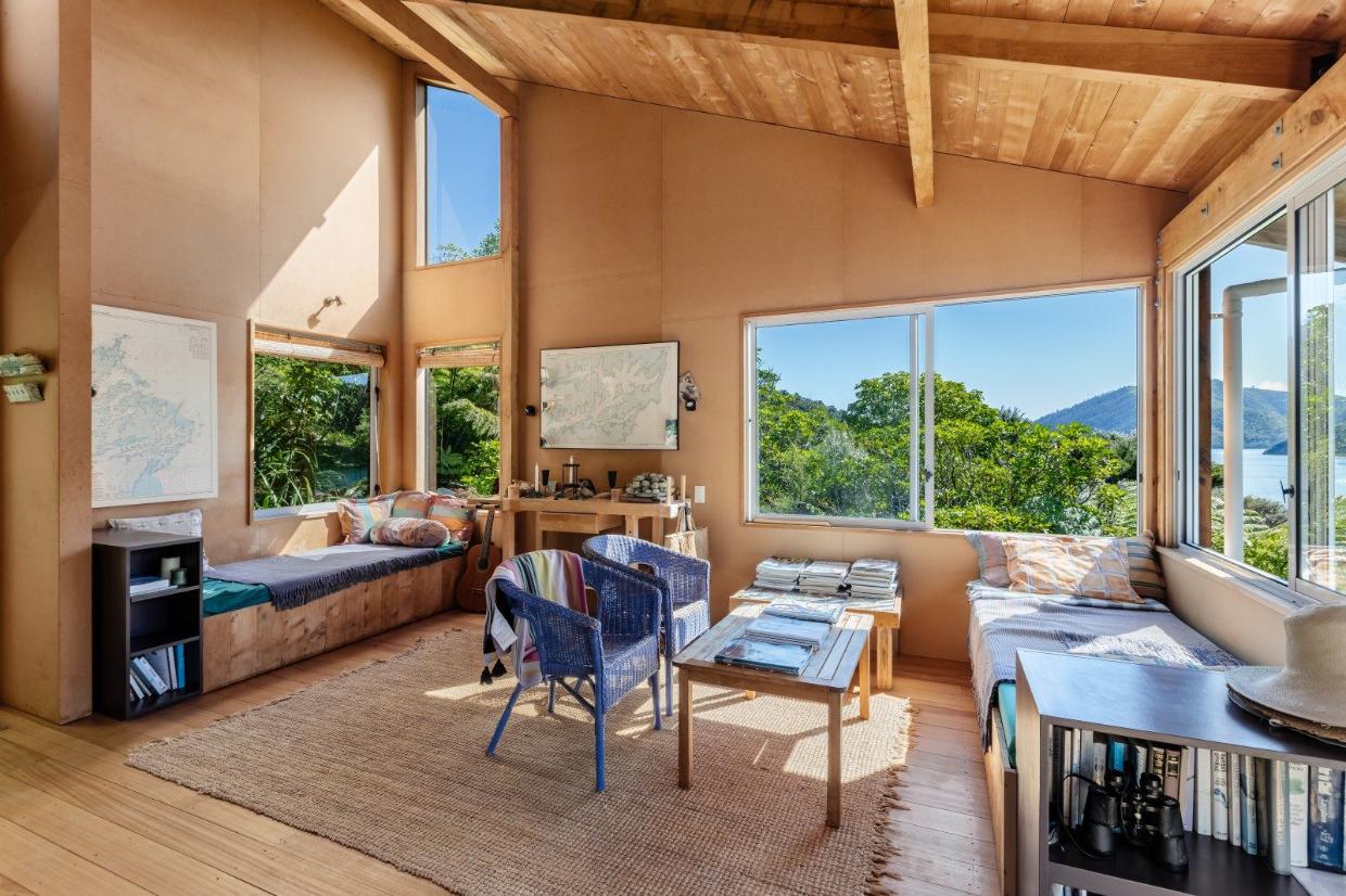Day beds in the living area provide additional sleeping accommodation.