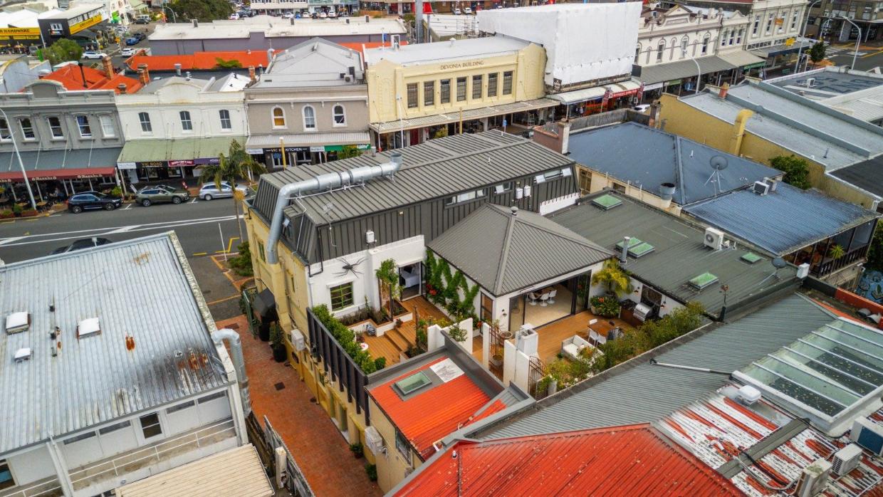 The surprise for first-time viewers? An expansive garden terrace behind the former post office. 