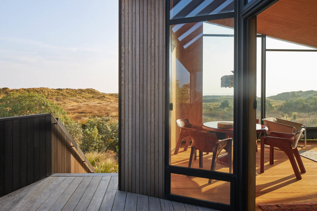 Not quite perpendicular to the sea, the house is aligned perfectly with the island of Tuhua.