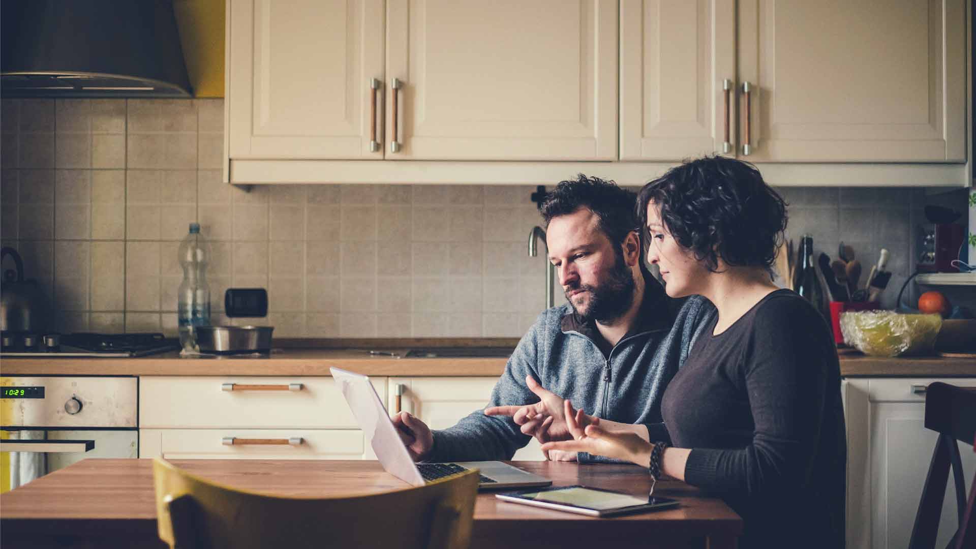 Couple discussing home loan options.