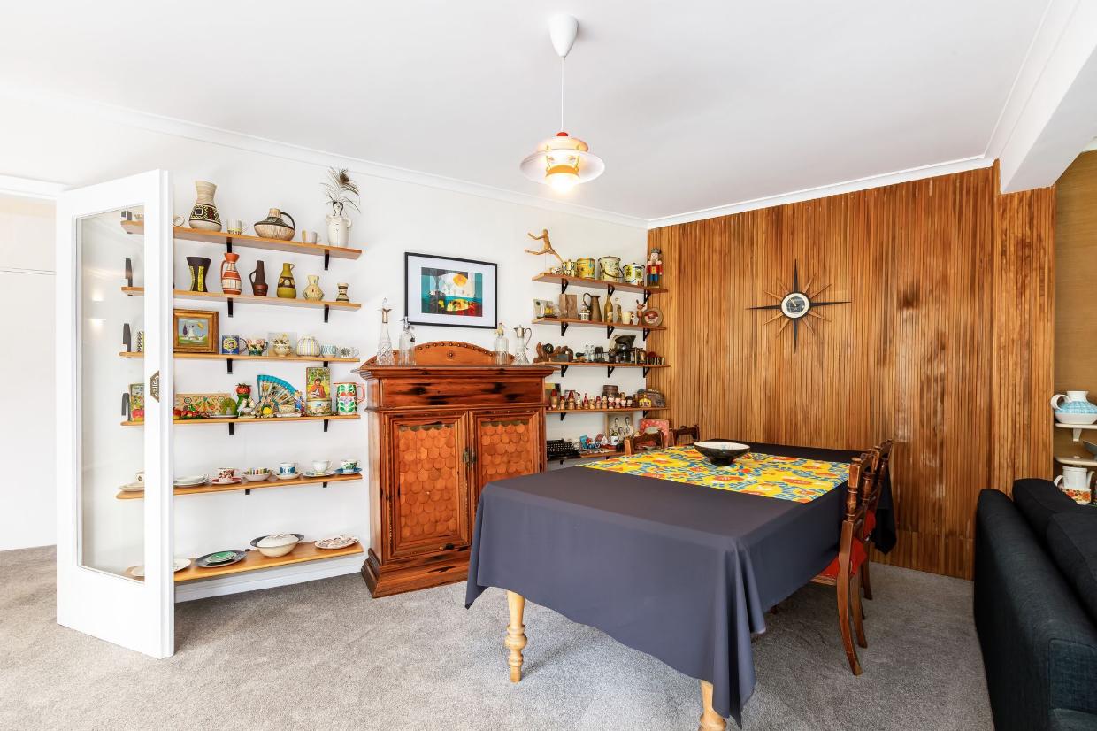 Original 50s wood paneling is still a star of the show.