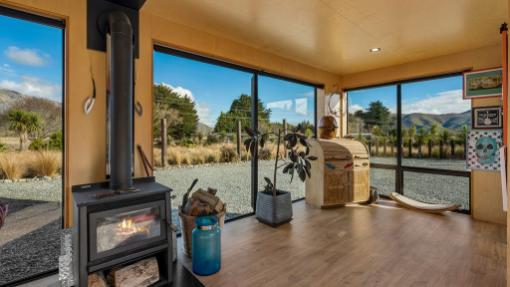 Two fires keep the 102m² home warm. Photo: COLLIERS/TRADE ME