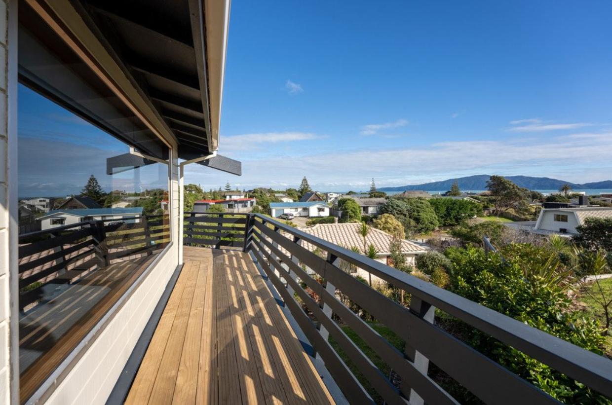 A stunning deck on the exterior with views overlooking the beach. 