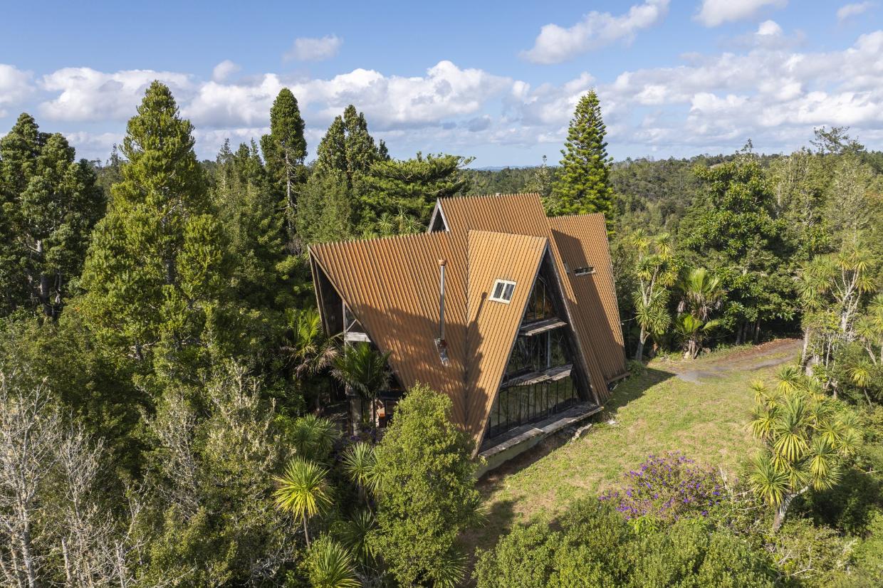 The property is surrounded by a massive section of land and forest. 