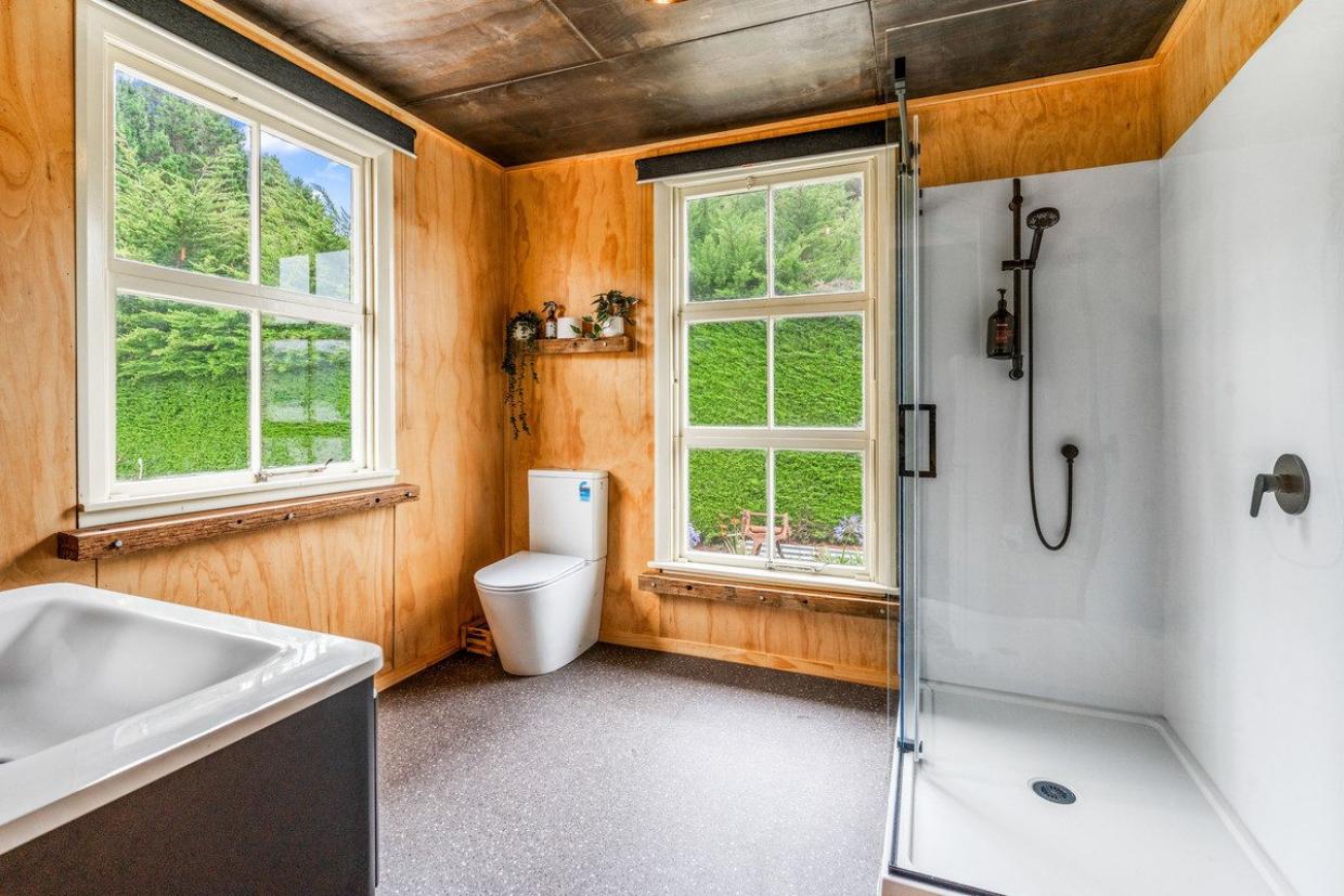A new bathroom with a rustic style