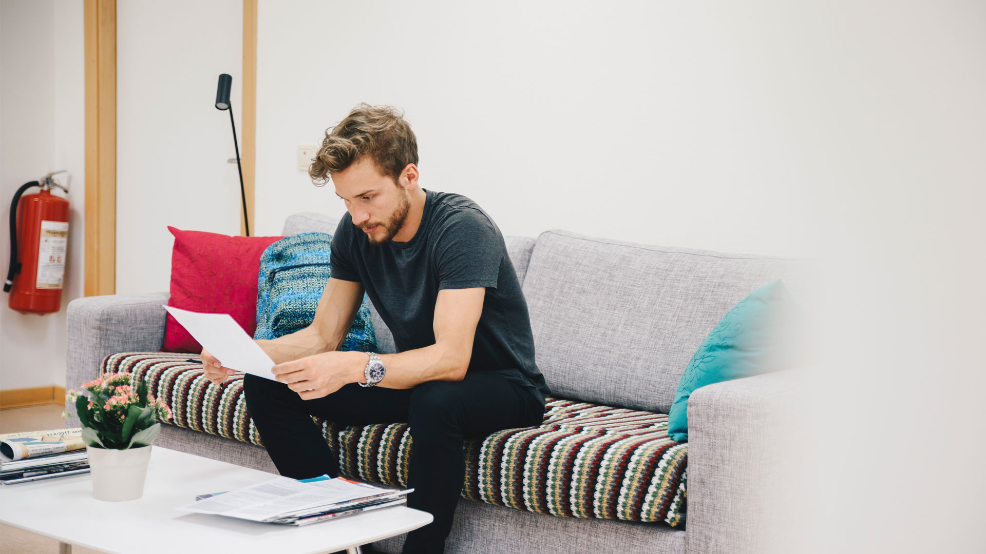 Tenant reading a written notice of rental increase.