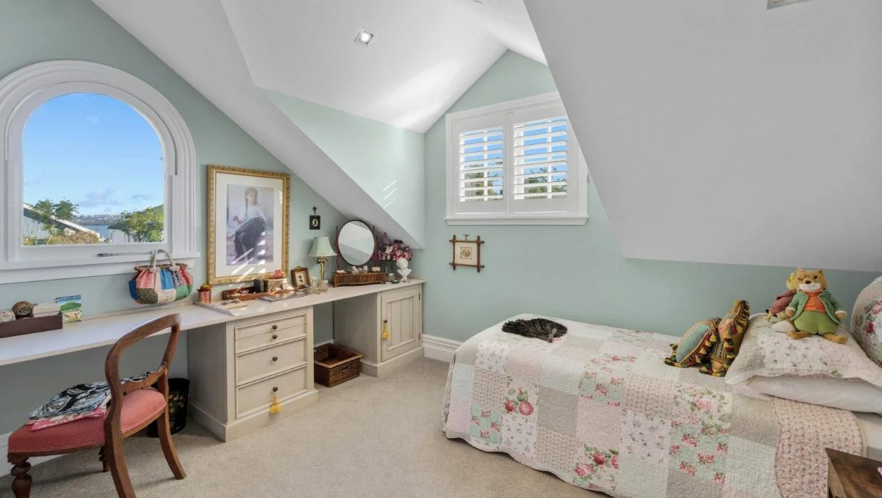 The home has several bedrooms on the top floor.