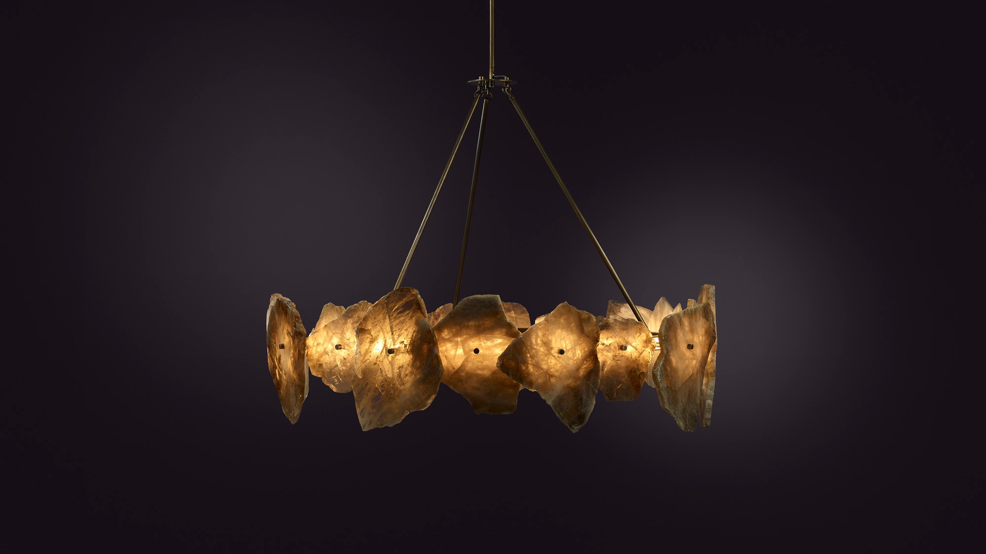 Pendant light with aged brass and quartz