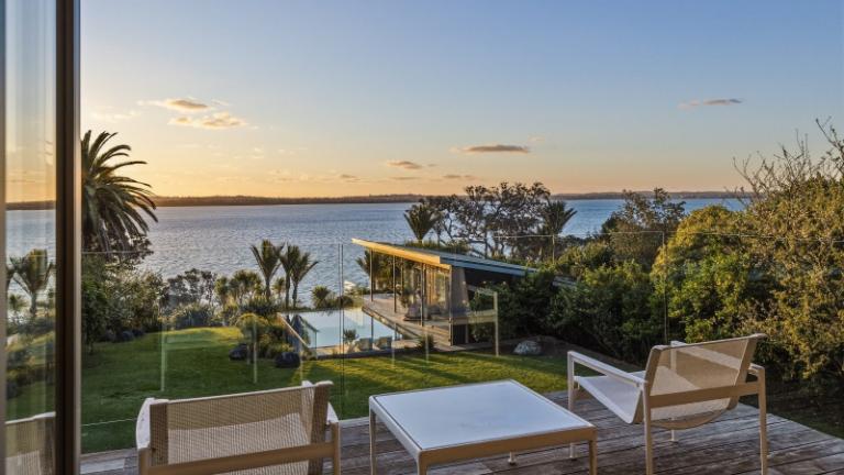 The house faces north-west and benefits from all-day sun. The garden has different varieties of apples, pears and plums, as well as guava, quince, figs, olives, feijoa and macadamia trees. Photo: NZ Sotheby's