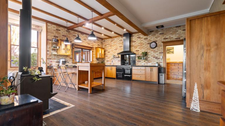 The kitchen is very generous. Photo: HARCOURTS/TRADE ME