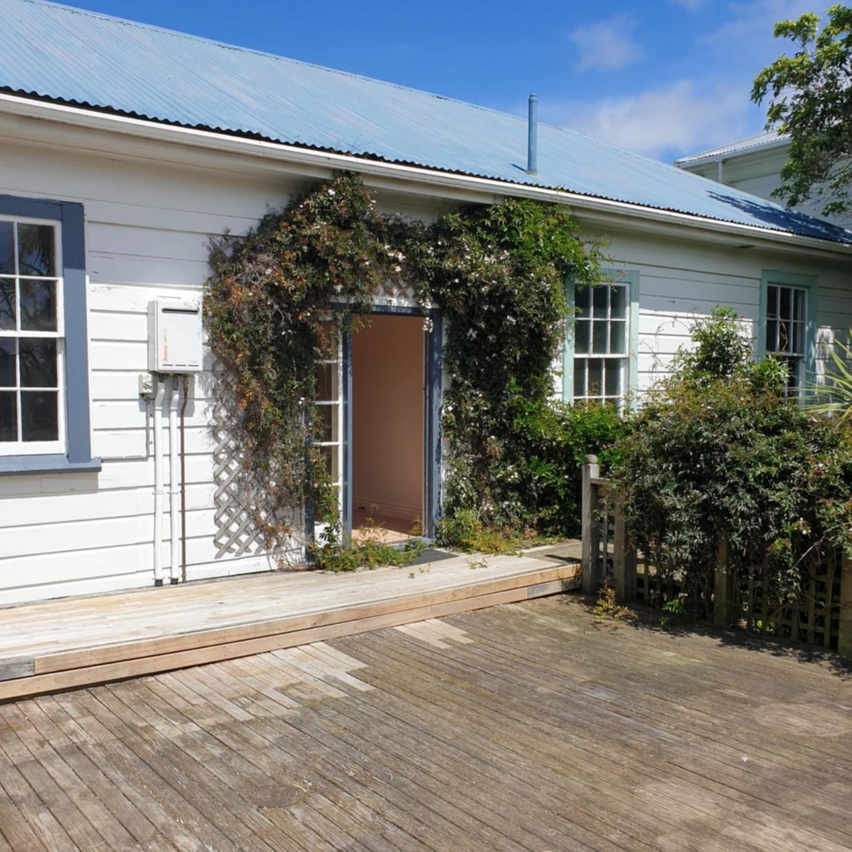 There are French doors opening out at the rear. 