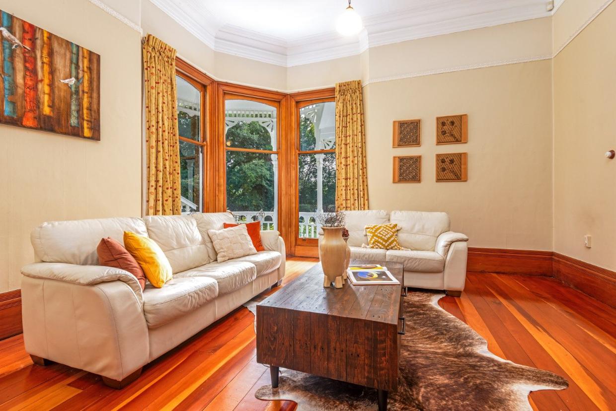This is the front room - the sash windows can be opened to access the veranda.